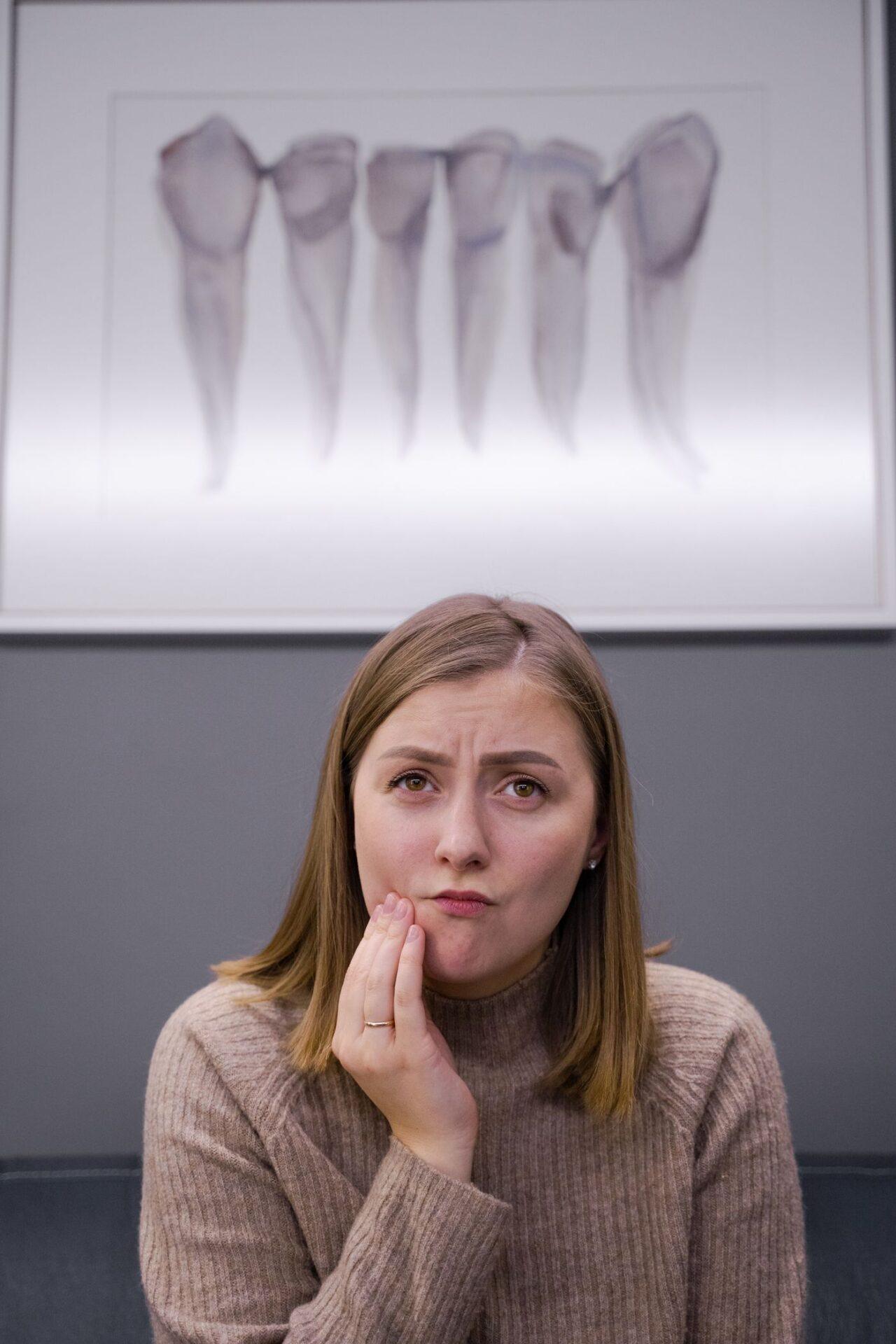 Patient with sudden tooth pain at an emergency dental clinic in Tillsonburg