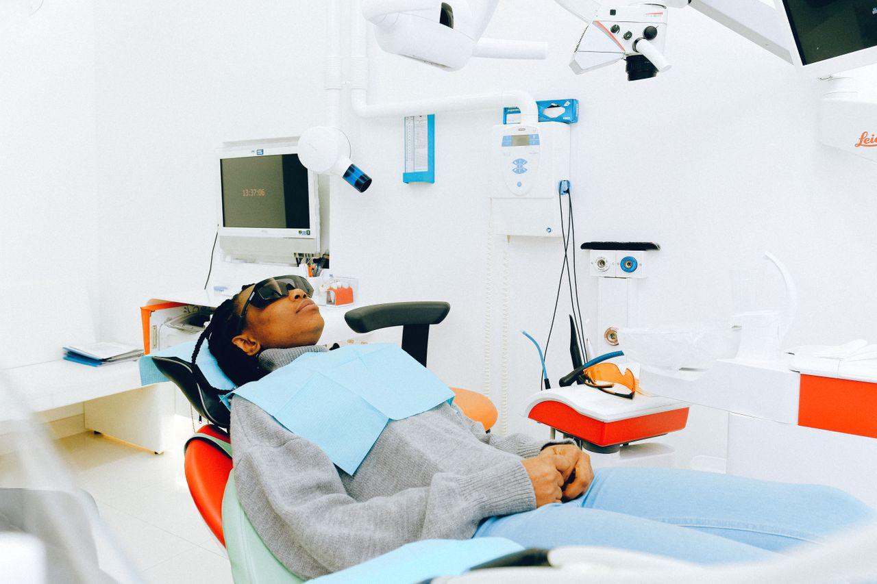 Woman sitting relaxed in a dental chair